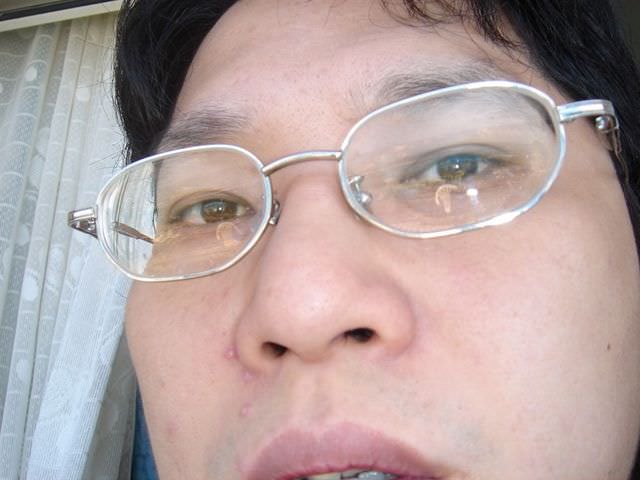 2006.8 夏日墾丁（舊相簿新敘述）:有個人一臉屎面。到底拍夠了沒？